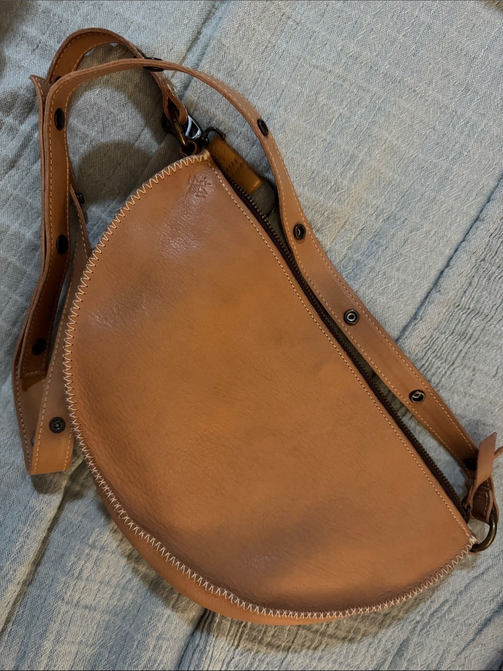 Leather Half-Moon Crossbody Bag in Tan